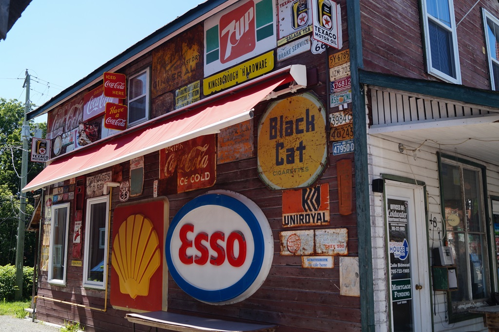 Store with lots of vintage signs