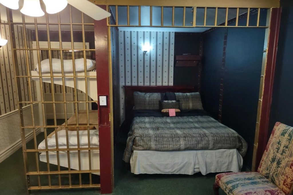 Cobourg Old Gaol exterior showing limestone walls and narrow barred windows in Northumberland County.