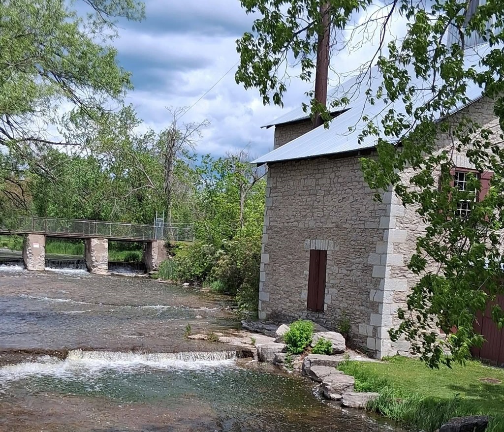 Mill by river