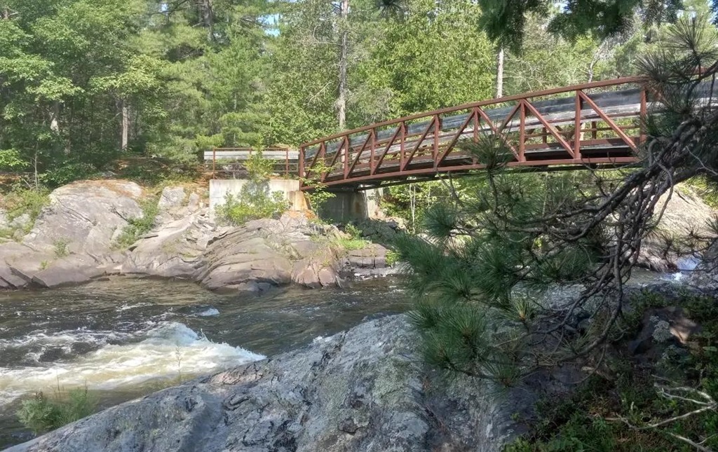 River Flows Under Bridge
