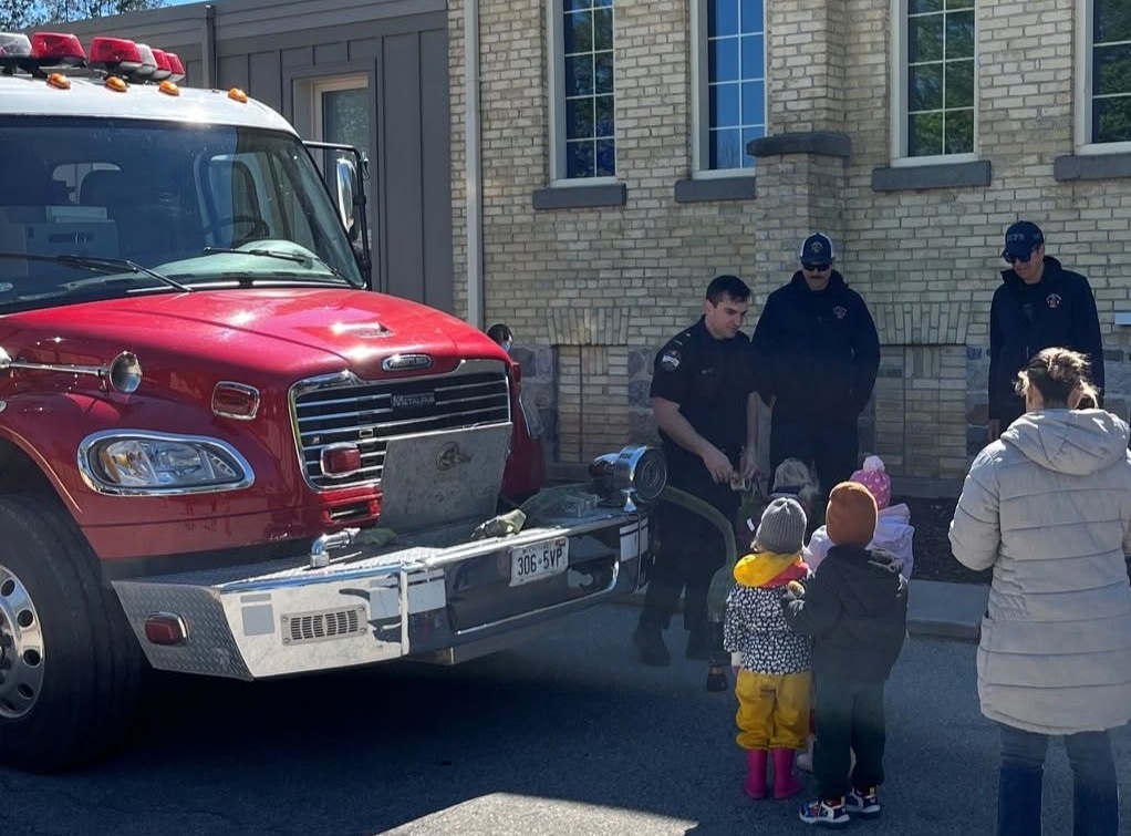 Firemen Teaching Kids