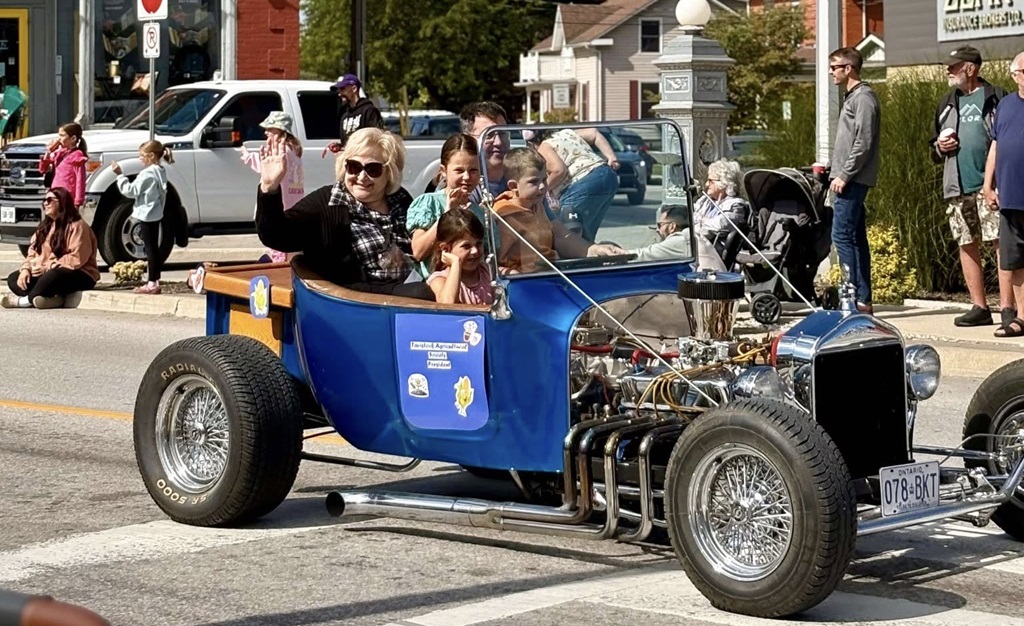 Enjoying the Tavistock Fall Fair Parade in the supped car